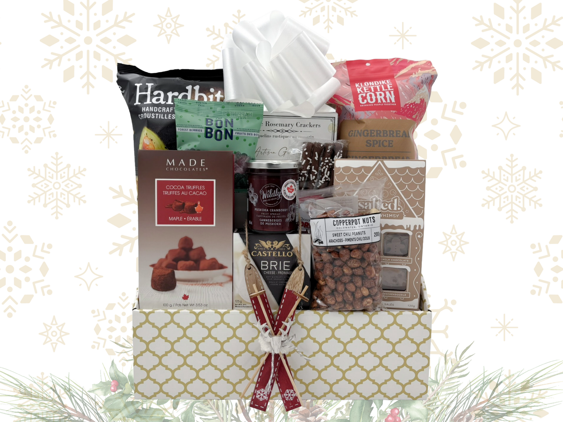 Gift basket with various snacks and treats on a decorative background