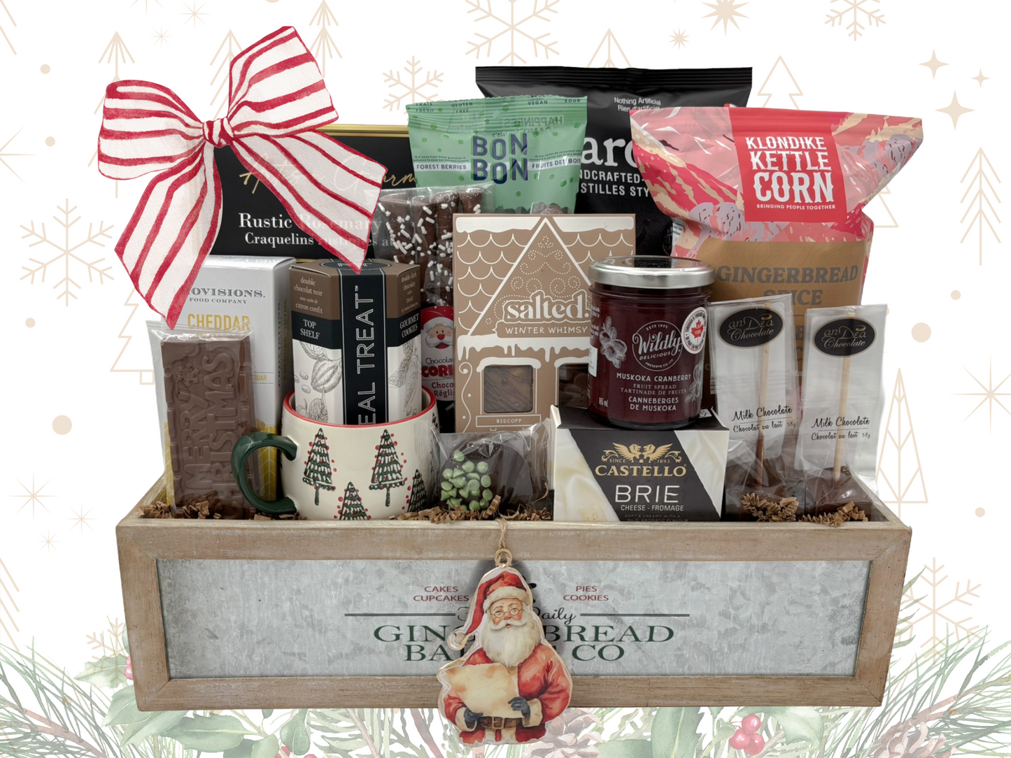 Gift basket with various items including a mug, snacks, and a Santa Claus figurine on a decorative background.