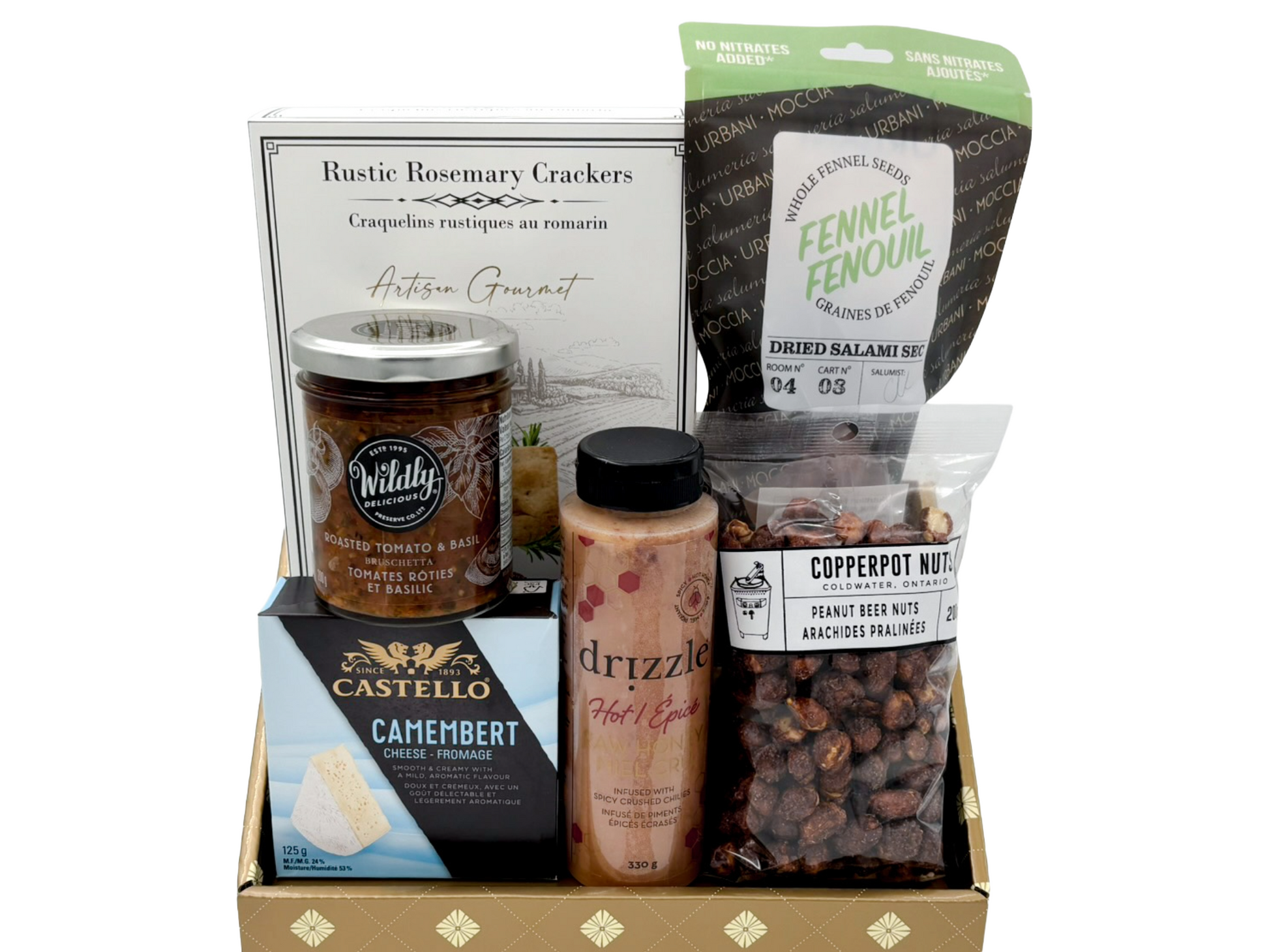 Assorted food items including crackers, cheese, and nuts in a box on a white background