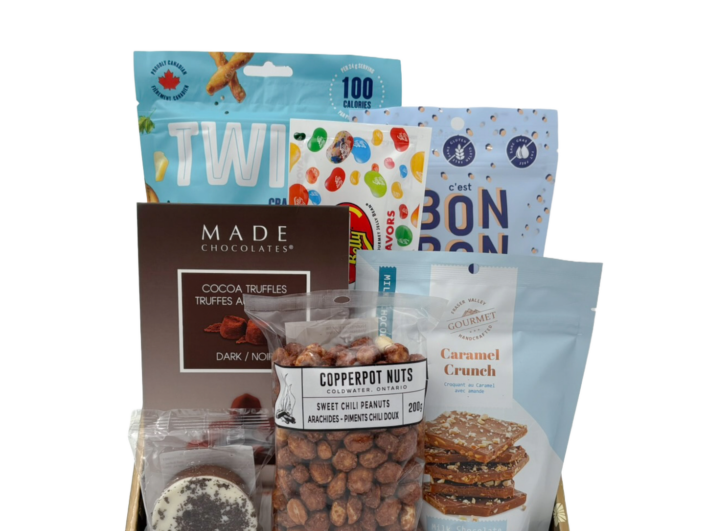 Assorted snacks and candies with visible packaging on a white background