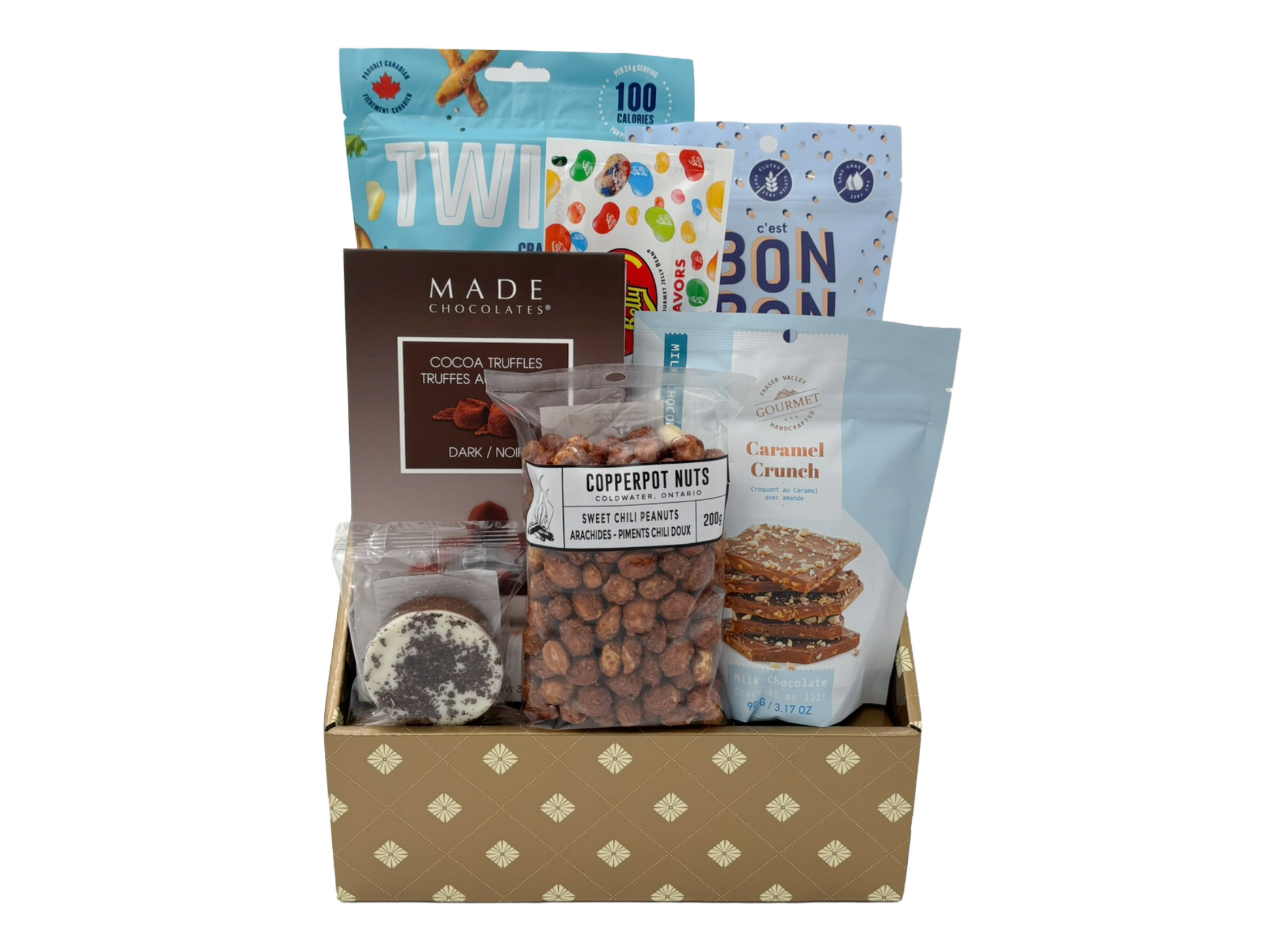 Assorted snack items in a box with visible brand names on packaging.