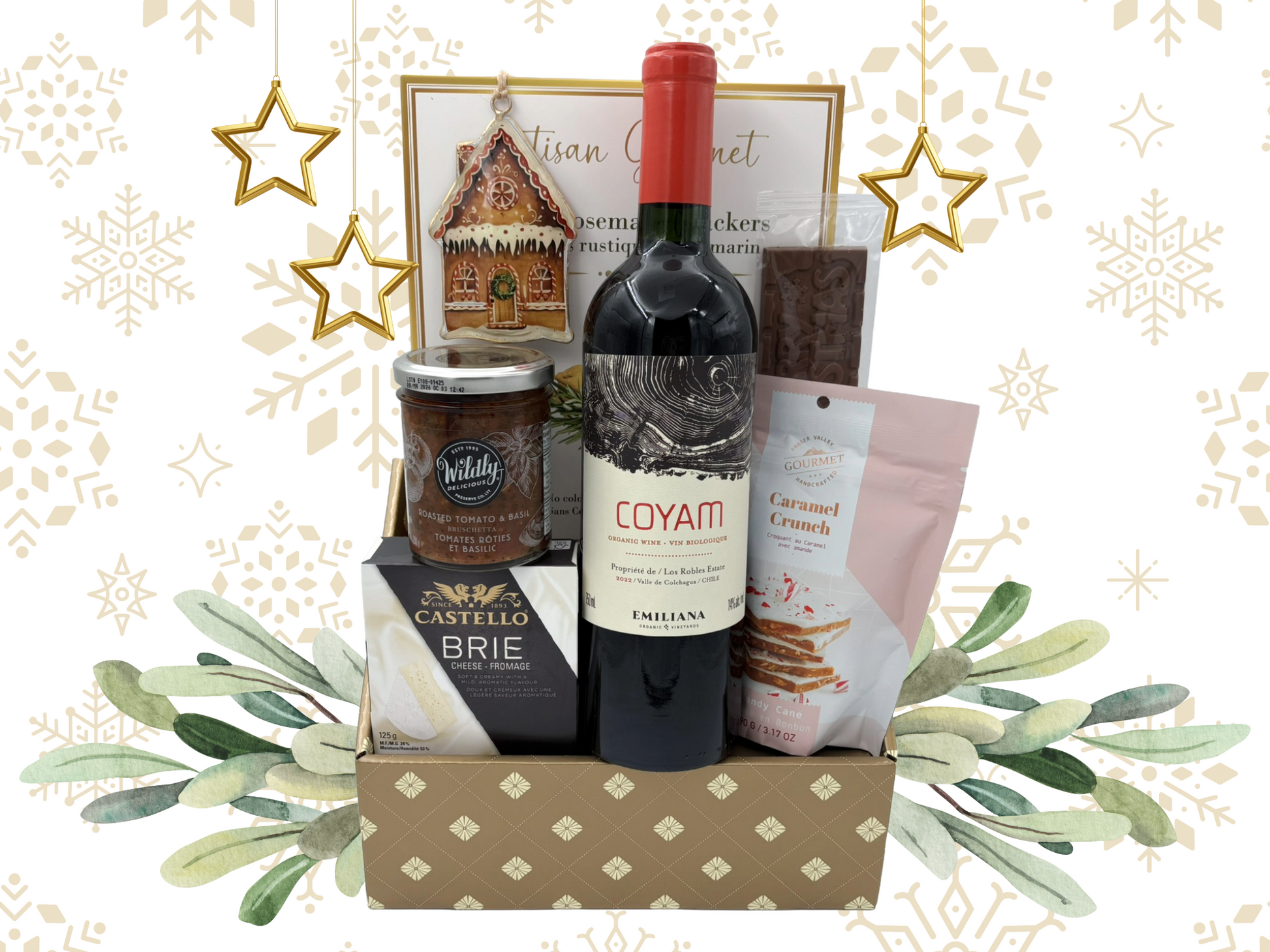 Gift basket with wine, cheese, and snacks on a decorative background